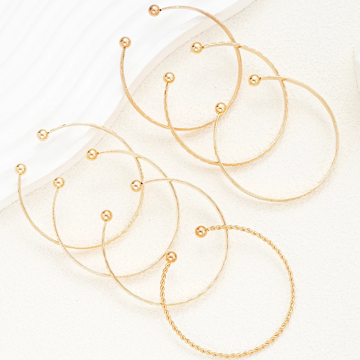 7-Piece Punk Gold Bracelet Set for Women with Goth Heart Designs