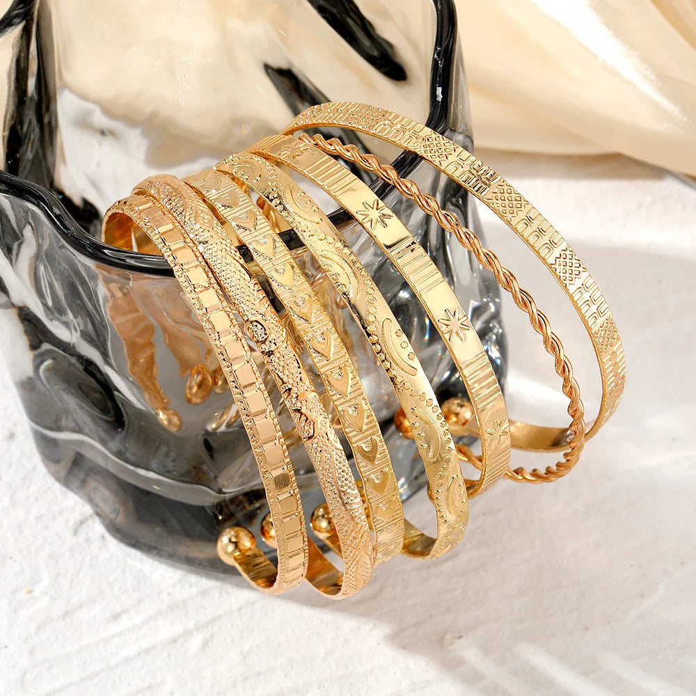 7-Piece Punk Gold Bracelet Set for Women with Goth Heart Designs